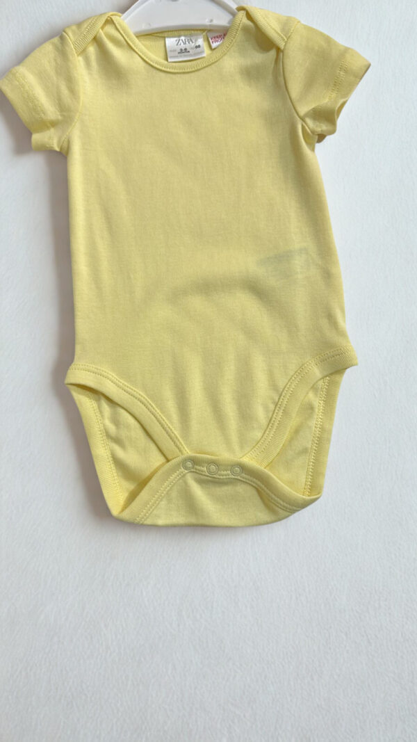 Body Amarillo Zara manga corta